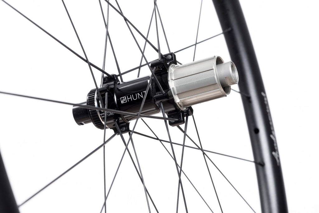 <h1>Freehub Body</h1><i>Featuring 3 multi-point pawls with 3 teeth each and a 48t ratchet ring. The result an impressively low 7.5 deg engagement angle. Durability is a theme for HUNT, and so all our freehub bodies have Steel Spline Insert re-enforcements to provide excellent durability against cassette sprocket damage often seen on standard alloy freehub bodies.</i>