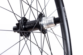<h1>Rear Hub</h1><i>We create wheels to match the needs of riders who want the most from their wheels. The Trail Wide hubs have been chosen to increase stiffness, bearing durability and overall strength of your wheelset. On the rear, the RapidEngage MTB hubs with a fast 5 degree engagement, means you will be able to clear those janky tech climbs with ease.</i>