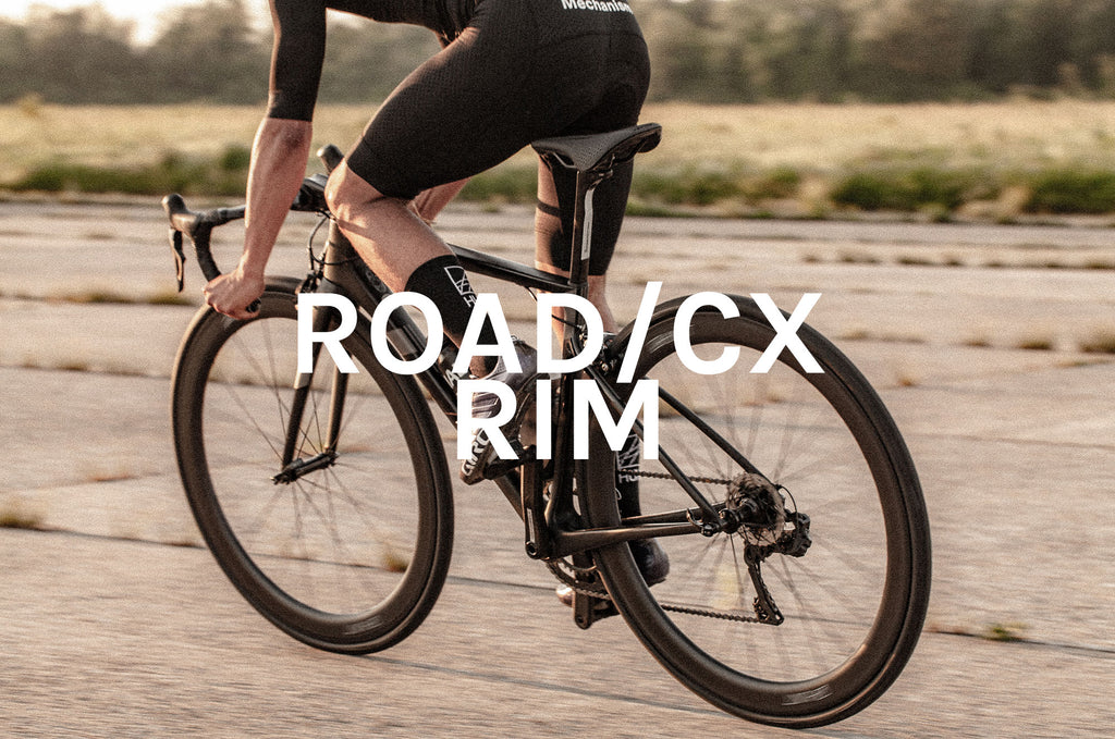 Road bike rim brake wheels with Road/CX Rim title across it  
