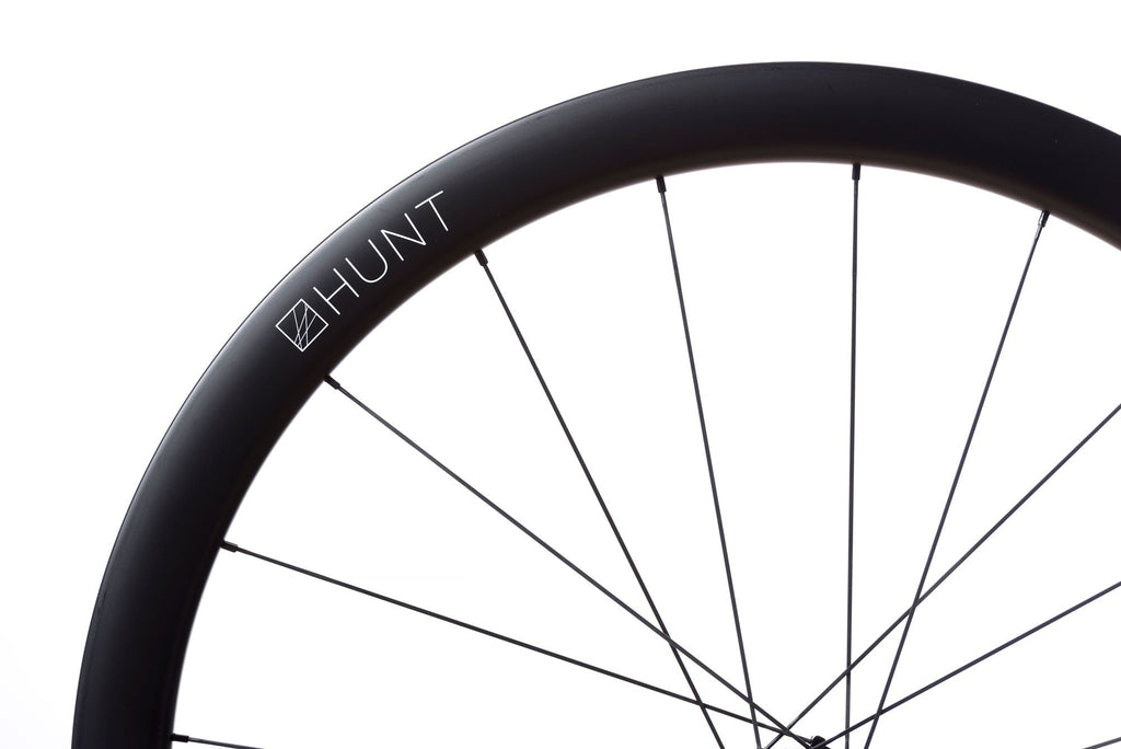 <h1>Tyre Width Optimisation</h1><i> Designed around a 20mm internal rim width optimised for a 25c tyre (but will of course work without compromise with both 23c and 28c tyres). They feature a hooked tyre retention design and are both fully ETRTO-compatible and tubeless-ready.</i>